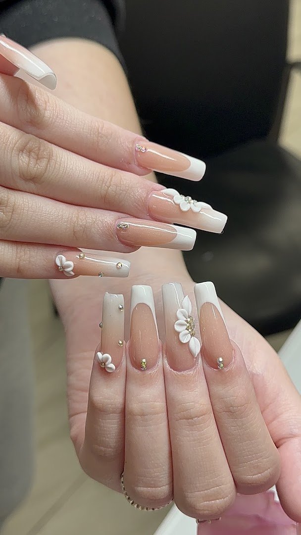 Manicured hands with glossy pink nails
