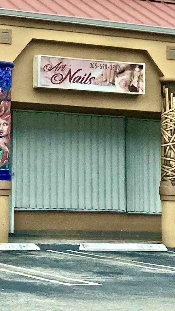 Nail art tools beside finished manicures