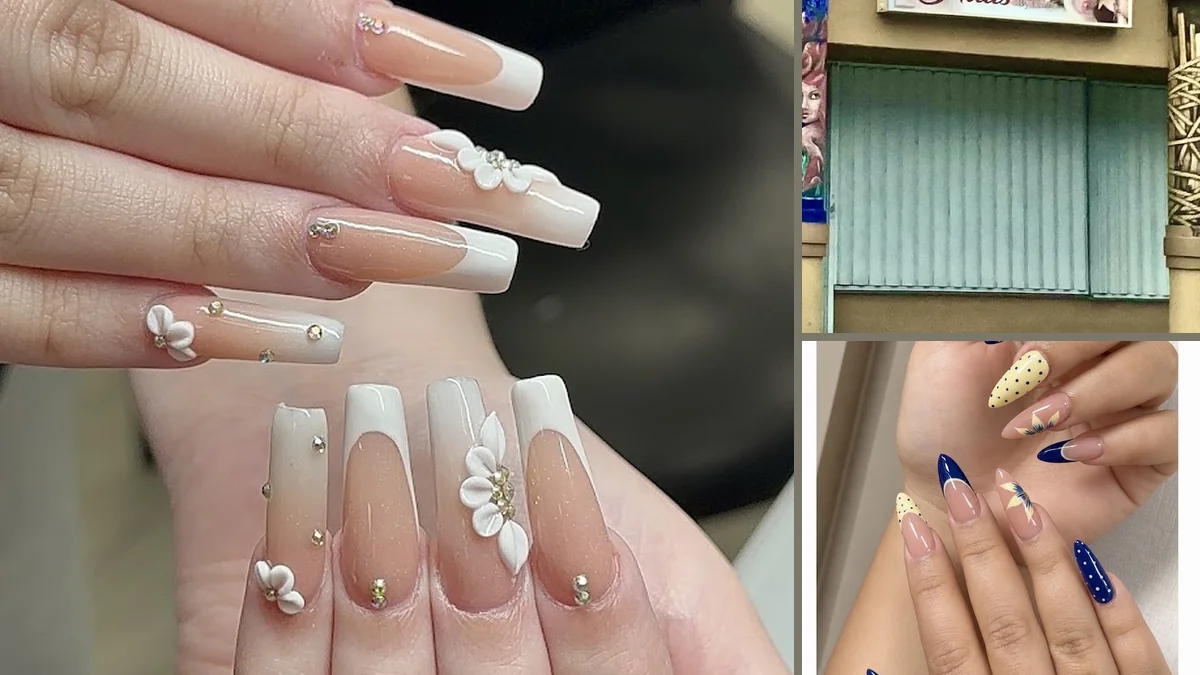 Close-up of acrylic nails with clean designs