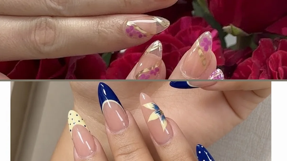 Close-up of acrylic nails with clean designs